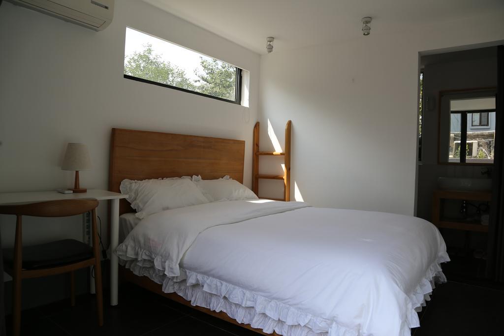Beijing Wohkoon Hostel-Nan Luo Gu Xiang Branch מראה חיצוני תמונה