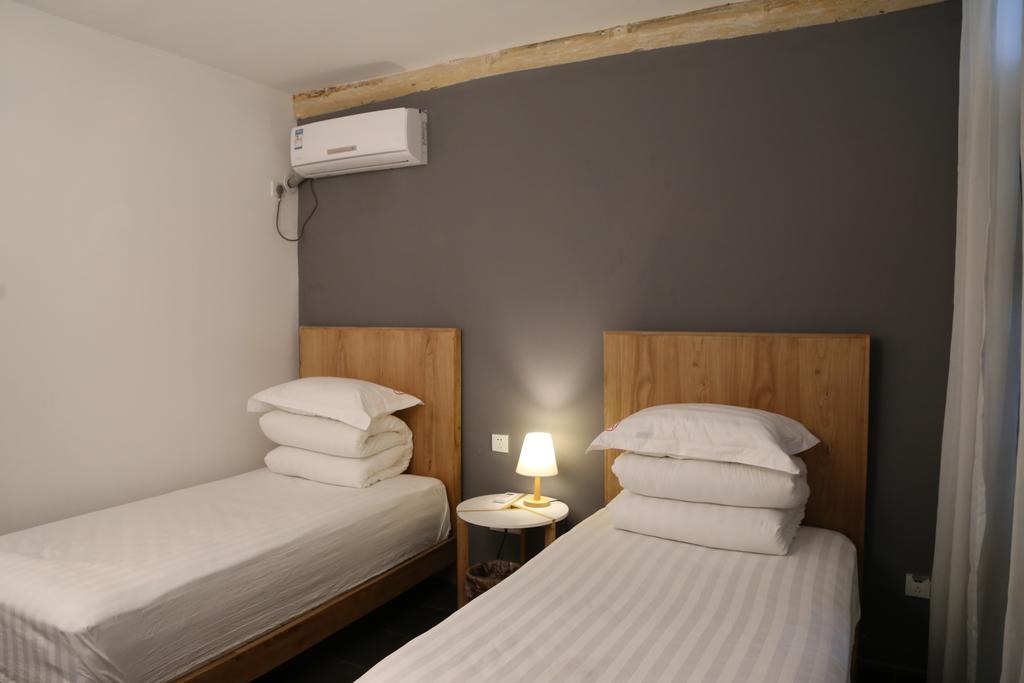 Beijing Wohkoon Hostel-Nan Luo Gu Xiang Branch מראה חיצוני תמונה